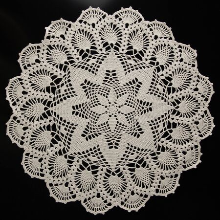 white lace on black background, crochetの写真素材