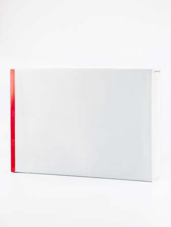 Packed set of cotton satin bed linen on a white backgroundの写真素材