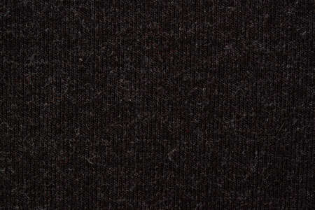 knitted melange fabric simple weave of black and gray threads, of connective-blanket stitch