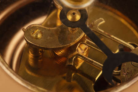 details of the mechanism of the home barometer, made of yellow metal and woodの写真素材