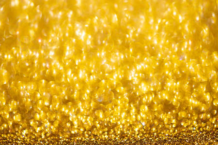 textured background with highlights, sparkling glitter of different colorsの写真素材