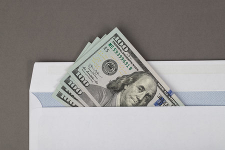 paper bills american dollars on a gray background, finance, money, convertible currencyの写真素材