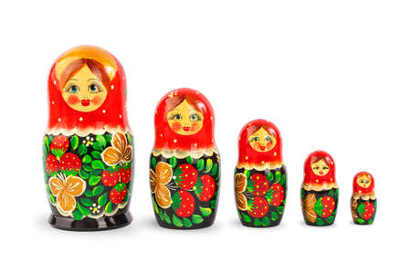 a set of Russian folk wooden dolls covered with patterns, isolate on a white backgroundの写真素材