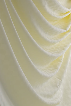 draped red silk fabric of satin weave, texture, backgroundの写真素材