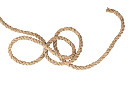 packing rope made of jute with a tied bow, isolate for clipping on a white backgroundの写真素材
