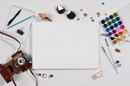 layout on a white table, mockup book with a clean spread and stationery, school backgroundの写真素材