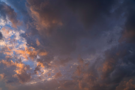 summer evening, sunset in yellow, orange and pink with clouds, background