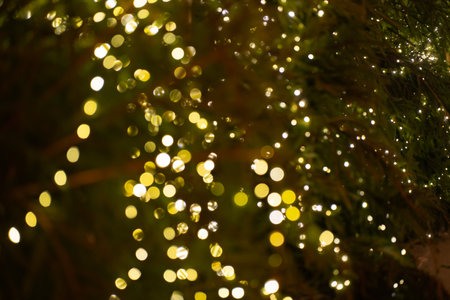 street glowing christmas garlands in defocus, bokeh, defocus lightの写真素材