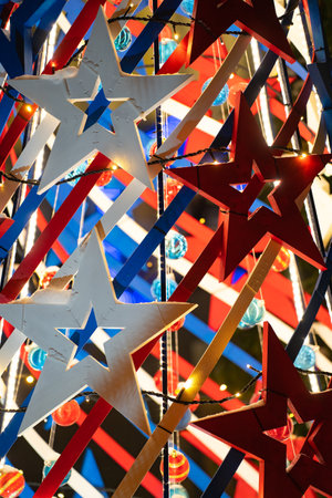 installation of stylized stars with festive lighting