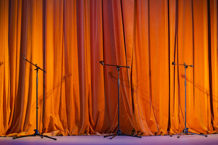 red-brown curtain on the stage with wooden floor and theater backstage, background, textureの写真素材