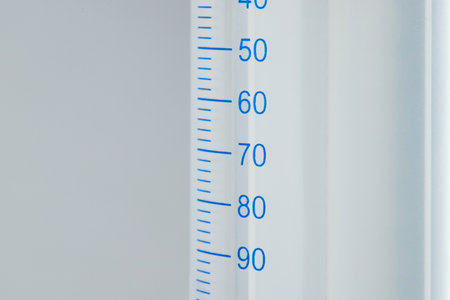 large-volume plastic syringe made of transparent plastic without a needle, for technical work,...