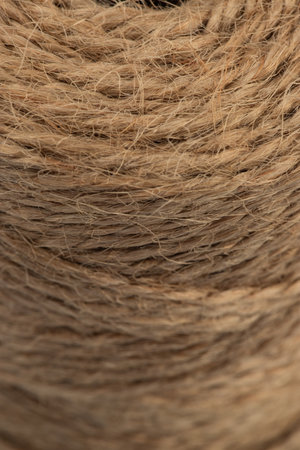 packing rope made of jute with a tied bow, isolate for clipping on a white background
