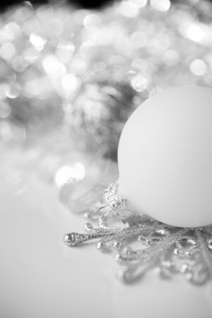 Silver and white christmas decoration on holiday background. Merry xmas card.の写真素材