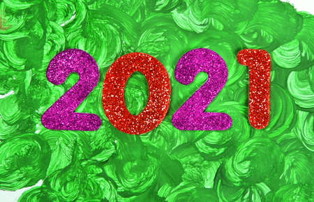 2021 decorative shiny new year numbers, hand drawn abstract stains green background