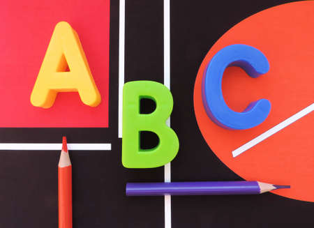 ABC letters alphabet and pncils on abstract background with geometric lines. education and back to school conceptの写真素材