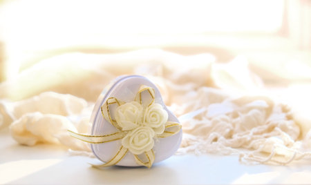 Blurred luxury white gift boxe. Light and shadow. Copy space Concept holiday. Happy Woman's Day, Mother's Day, Valentine's Day, Weddingの写真素材