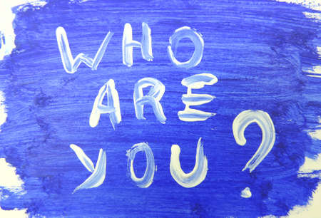 Who are You? "The inscriptions are handwritten in white paint on a blue backgroundの写真素材