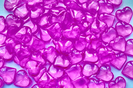 Blurred  crystal hearts background. Copy space. Holiday banner, web poster, flyer,  greeting card,...