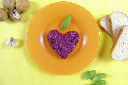 chopped beets with garlic and walnuts and garlic croutonsの写真素材