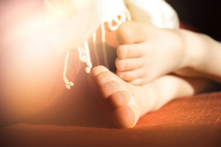 Close up barefoot, relax concept. Lying and enjoying rest. Soft blurred sunlight, cinematic styleの写真素材