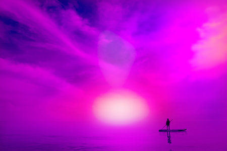 Sunset scenery of fantasy landscape with ethereal ocean and silhouette of child on the surfboard. Dreamy natureの写真素材