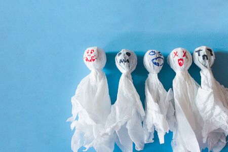 ghosts made of candy and napkins. decor for the holiday happy Halloween with their own handsの写真素材