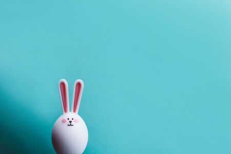 hare on a blue background. Minimal Easter conceptの写真素材