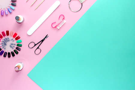 Nail care. set of professional manicure tools. Top view of manicure and pedicure equipment on pink background. Manicure concept. flat lay. copyspace for your text.の写真素材