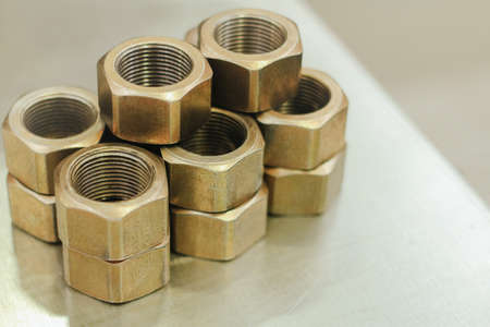 The product is turned on a lathe in close-up. Metalworking at the factory. the workpiece is received...