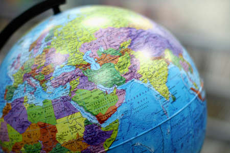 Russia, Saint Petersburg November 13, 2020: a bright multicolored globe with names in Russian for...