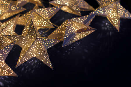 background for Christmas and new year holidays. decorations for the holiday. white paper stars.の写真素材