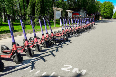 Russia, Saint Petersburg May 31, 2021 electric scooter rental. lots of electric scooters in the parking lotのeditorial素材