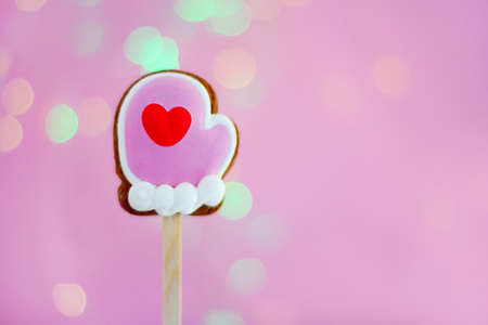 Christmas gingerbread in the shape of glove. Delicious sweet festive treatの写真素材