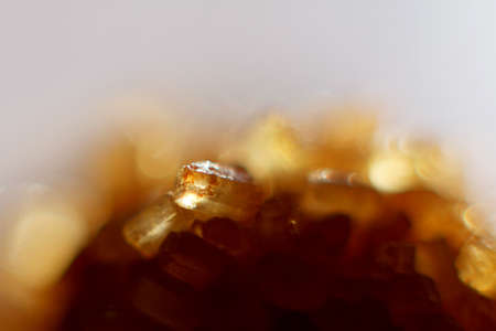 brown cane sugar crystals. close up