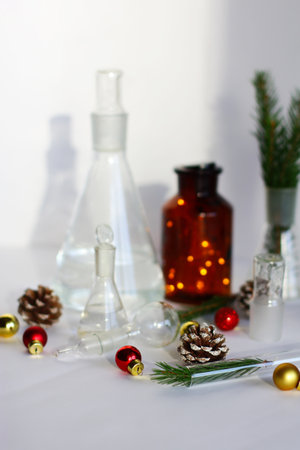 new year in the chemical laboratory. holidays at work. chemical dishes on the tableの写真素材