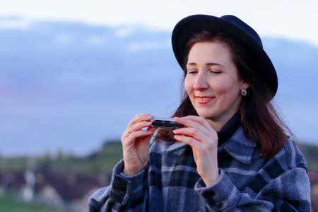playing the harmonica. a compact musical instrument that is always at hand