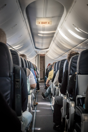 Interior view of an airplane during the flight, seating at the aisleのeditorial素材