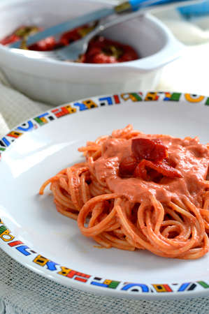 Spaghetti with creamy pesto baked red peppers の写真素材