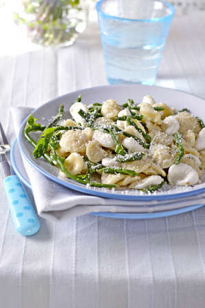 Orecchiette pasta with wild asparagus, mozzarella and Parmesan cheese  Italian food の写真素材