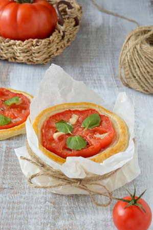 Tomato tart with fresh marjoram and garlic  Close-up の写真素材