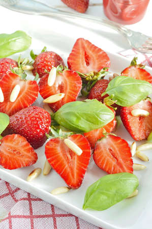 Strawberry salad with basil and pine nuts   Selective focus の写真素材