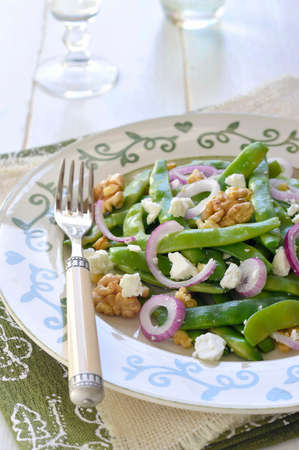 Green beans salad with Greek Feta cheese and walnuts  Selective focus の写真素材