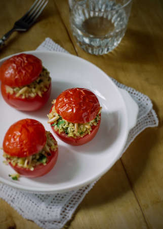 Baked Tomatoes Stuffed With Bulgur Wheat, Herbs and Pine Nuts, Top Viewの写真素材