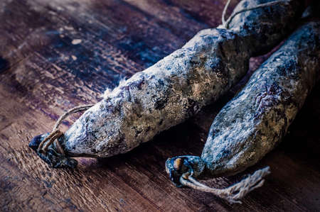 Homemade Salami, Sausage, Food. Dark style food styling