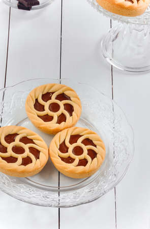 Delicious Italian Sweet Tarts Chocolate  on white wooden backgoundの写真素材