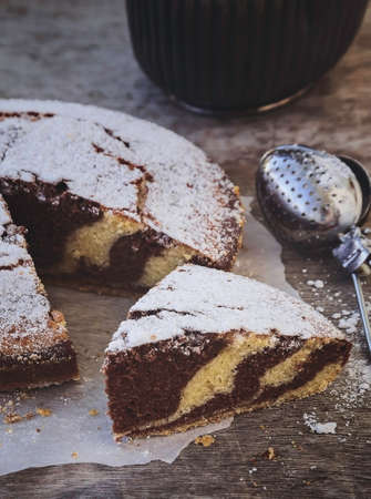 Cake. Marble cake cup of coffee. Dark photoの写真素材