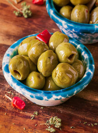 Green Olives with Chili, Oregano. Close-upの写真素材
