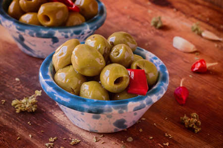 Preserves. Green Olives with Chili, Oregano.の写真素材
