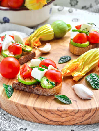 Toasted bread topped with grilled zucchiniの写真素材