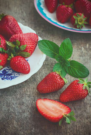 Sweet Red Strawberries with Mint, Style Rustic, Toned Imageの写真素材